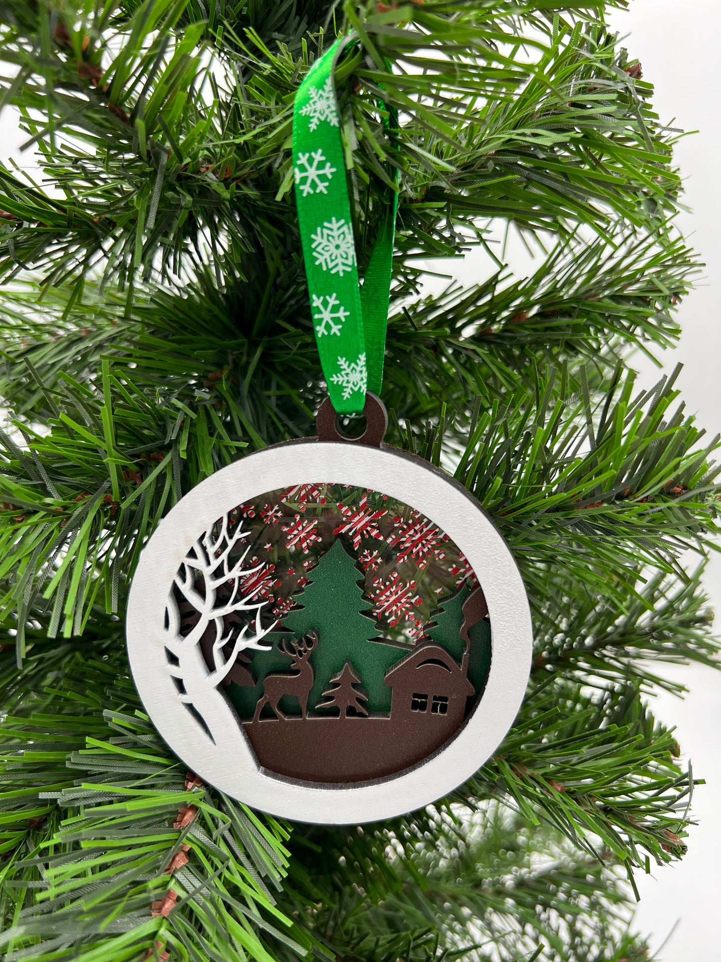 Christmas Ornament - 4 layer Deer and Cabin Winter scene with red/white snowflake acrylic back