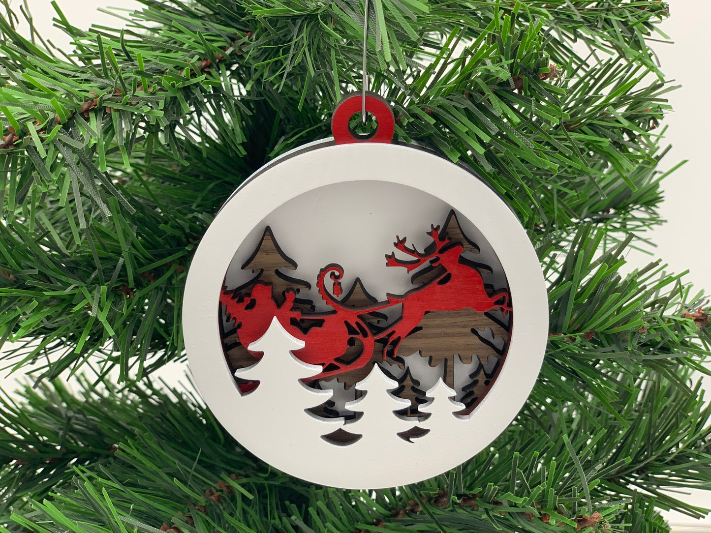Christmas Ornament - 4 layer Santa and sleigh scene with red sleigh and white back