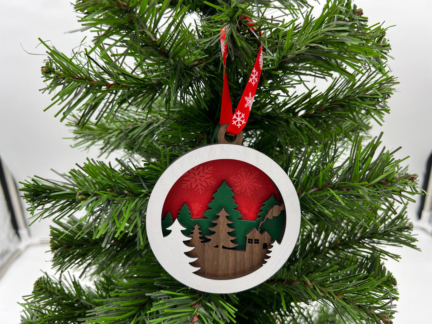 Christmas Ornament - 4 layer Trees and Cabin Winter scene with red snowflake back