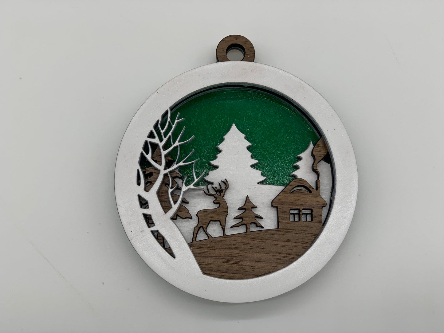 Christmas Ornament - 4 layer Deer and Cabin Winter scene with Green back